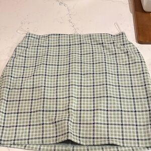 Chic Plaid Mini Skirt in Green by [Brand]